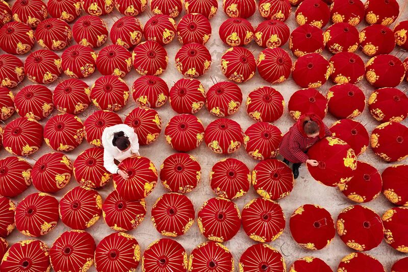 Red lanterns are produced for New Year's Day in Danzhai, China's south-western Guizhou province. AFP