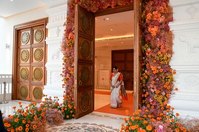 Flowers decorate the main entrance of the Hindu temple at Jebel Ali, Dubai.  Khushnum Bhandari / The National
