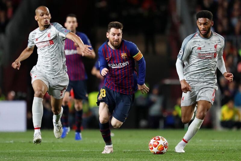 Soccer Football - Champions League Semi Final First Leg - FC Barcelona v Liverpool - Camp Nou, Barcelona, Spain - May 1, 2019  Barcelona's Lionel Messi in action with Liverpool's Fabinho and Joe Gomez   REUTERS/Susana Vera