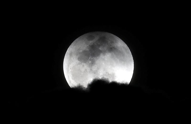 DUBAI , UNITED ARAB EMIRATES , JAN 31 – 2018 :- View of the Super moon taken at the Al Thuraya Astronomy Center in Mushrif Park in Dubai.  (Pawan Singh / The National) For News. Story by Nawal