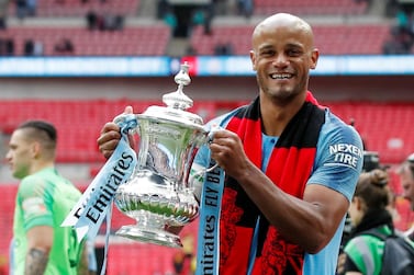Soccer Football - FA Cup Final - Manchester City v Watford - Wembley Stadium, London, Britain - May 18, 2019 Manchester City's Vincent Kompany celebrates with the trophy after winning the FA Cup REUTERS/David Klein