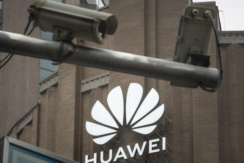 Public surveillance cameras are mounted to a pole in front of Huawei Technologies Co.'s new flagship store in Shanghai, China, on Wednesday, June 24, 2020. The store is Huawei's largest in the world, with a business area of nearly 5000 square meters, according to the company. Photographer: Qilai Shen/Bloomberg