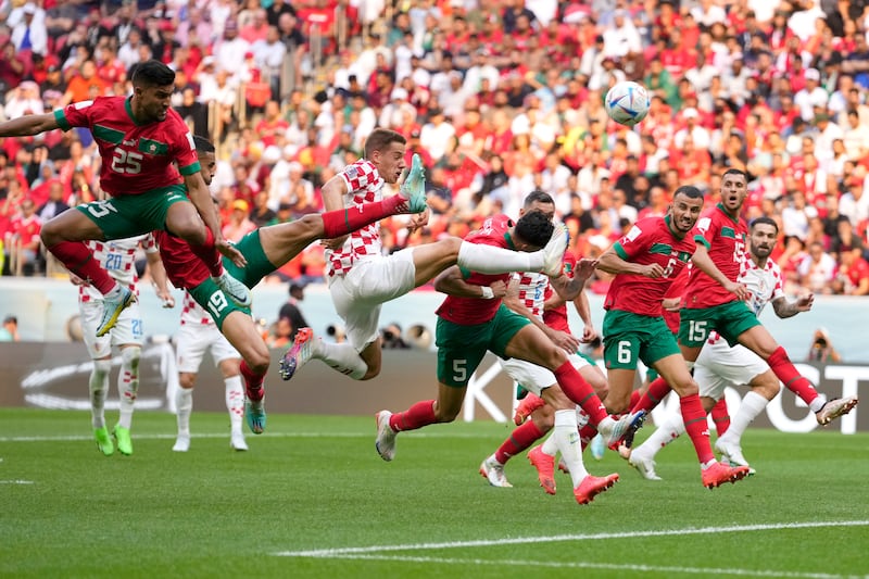 Croatia's Mario Pasalic lunges for the ball. AP