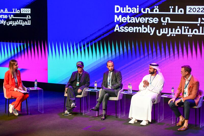 From left, Sarah Forster from 'The National', Samuel Hamilton, creative director at the Decentraland Foundation, Joe Abi Akl, chief corporate development officer of Majid Al Futtaim, Ali Sajwani, general manager of operations at Damac Properties, and Guy Parsonage, metaverse lead at PwC, during a panel discussion at the Dubai Metaverse Assembly on Wednesday. Khushnum Bhandari / The National