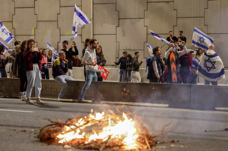 The Tel Aviv protest swelled on Saturday to about 200,000 demonstrators, according to Israeli media estimates. AFP