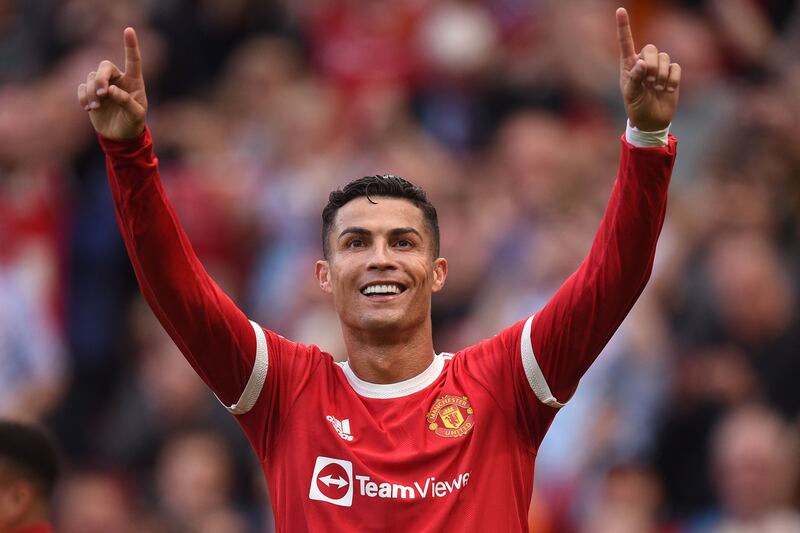 Manchester United's Cristiano Ronaldo celebrates after scoring against Newcastle United at Old Trafford on September 11, 2021. AFP