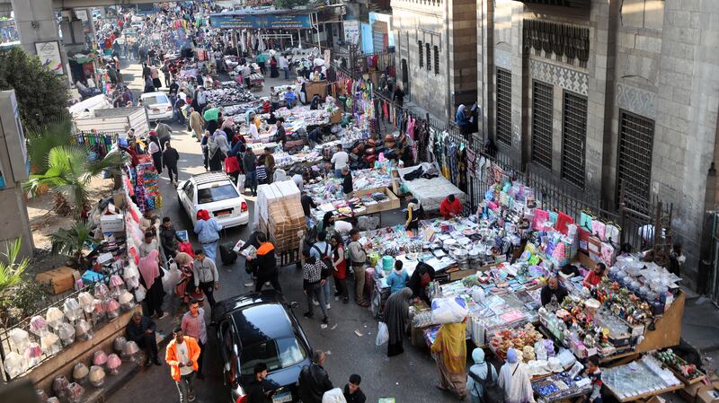 Port Said Street market in Cairo. Fitch says currency adjustments will again test the population's ability to absorb shocks. EPA