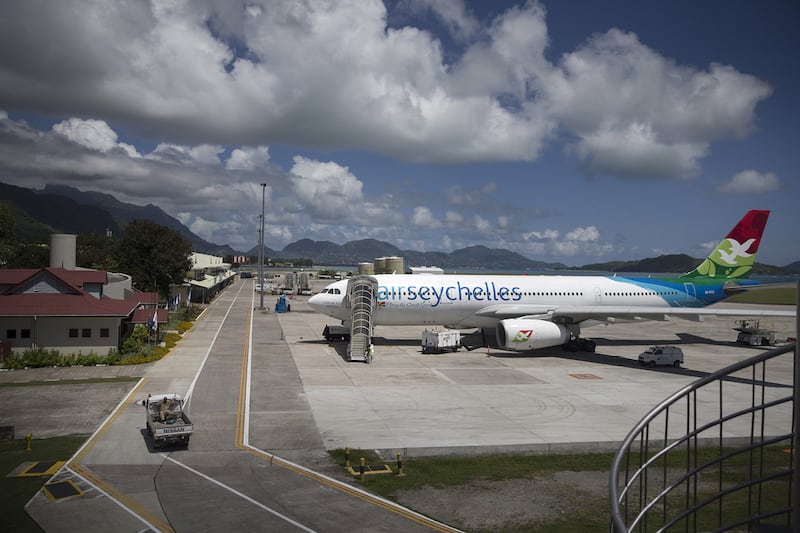 An Air Seychelles plane stands parked, undergoing servicing, at Victoria airport, Mahe. Silvia Razgova / The National