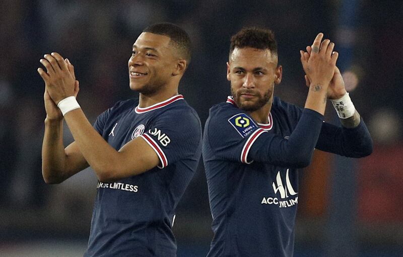 Kylian Mbappe and Neymar applaud the crowd after PSG clinch the Ligue 1 title. EPA