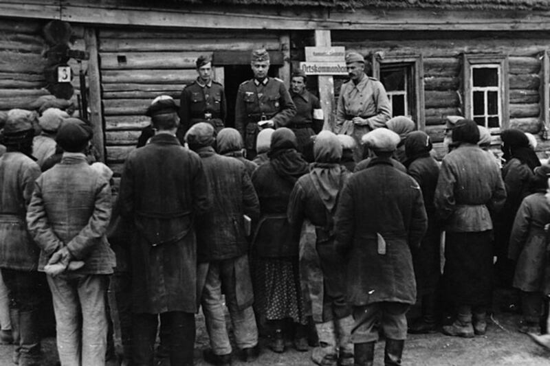 Ukrainians await orders from German soldiers, circa 1941-45. Rachel Seiffert’s A Boy in Winter is a story set during the round-up of Jews in a Ukrainian town in 1941, showing the bravery of strangers as well as the cowardice of the collaborators. Corbis via Getty Images