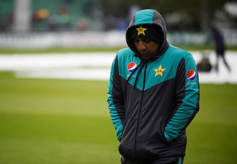 Pakistan captain Sarfraz Ahmed returns to the pavilion at Malahide after inspecting the pitch. Clodagh Kilcoyne / Reuters