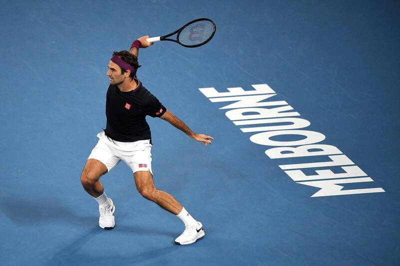 epa08159393 Roger Federer of Switzerland in action during his third round match against John Millman of Australia on day five of the Australian Open tennis tournament at Rod Laver Arena in Melbourne, Australia, 24 January 2020.  EPA/LUKAS COCH AUSTRALIA AND NEW ZEALAND OUT