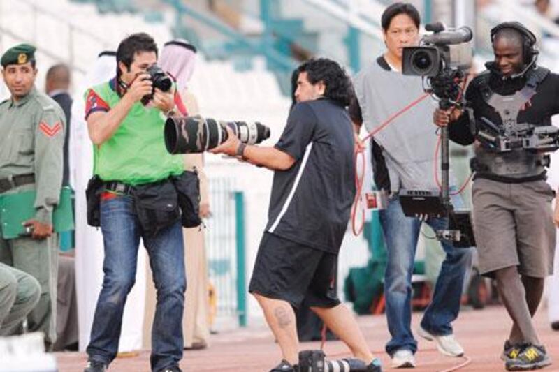 Diego Maradona, the Al Wasl coach, had a bit of fun with photographers during yesterday’s 2-1 defeat to Dubai.