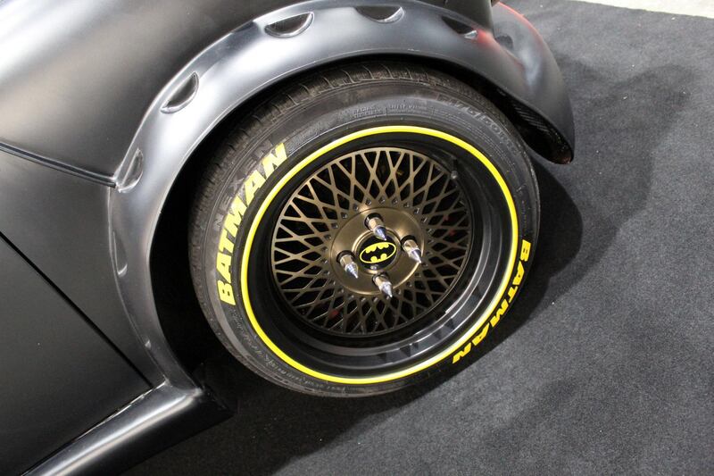 A Batman inspired wheel is on display.