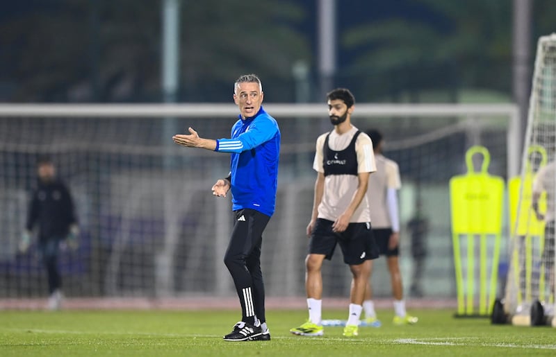 UAE coach Paulo Bento takes charge of a training session.