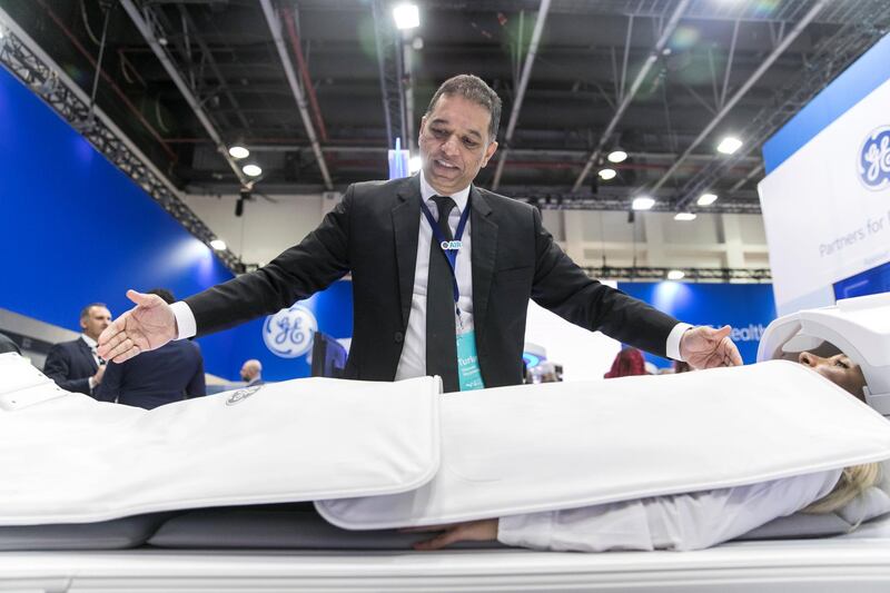 DUBAI, UNITED ARAB EMIRATES - Jan 30, 2018.
Rajesh George, MR Premium Segment Product Manager, EGM & Africa, GE Healthcare, presents GE's new set of coils for its SIGNA Premier wide bore 3T MR system, with a flexible design meant to increase patient comfort during whole body exams. 

(Photo by Reem Mohammed/The National)

Reporter: Nick Webster
Section: NA