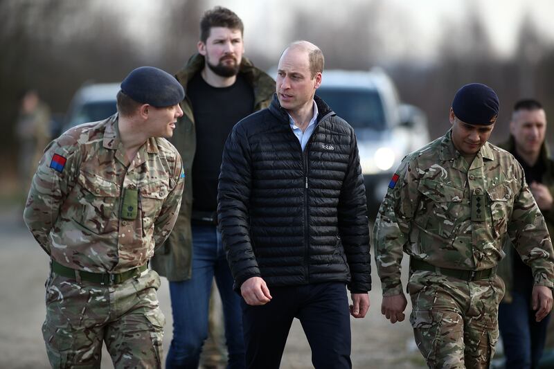 Prince William meets soldiers stationed in Poland. EPA