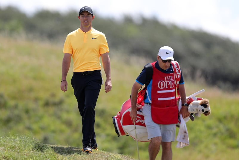 Northern Ireland's Rory McIlroy and his caddie during day four of The Open Championship 2017 at Royal Birkdale Golf Club, Southport. PRESS ASSOCIATION Photo. Picture date: Sunday July 23, 2017. See PA story GOLF Open. Photo credit should read: Andrew Matthews/PA Wire. RESTRICTIONS: Editorial use only. No commercial use. Still image use only. The Open Championship logo and clear link to The Open website (TheOpen.com) to be included on website publishing.