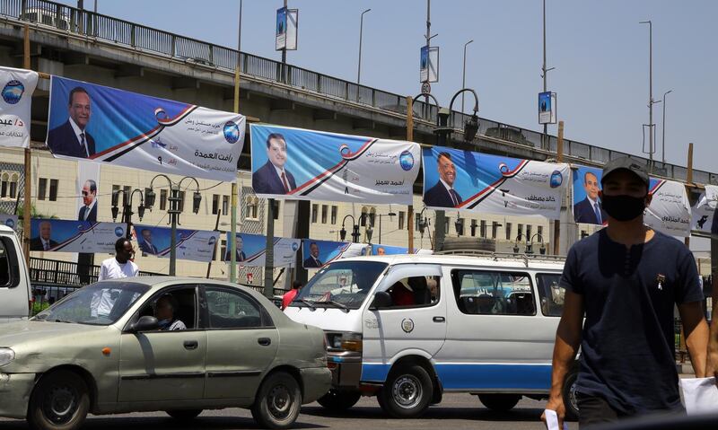 epa08584908 Senate election campaign banners hung on a bridge in Cairo, Egypt, 05 August 2020. Egypt will hold its Egyptian Senate elections on 11 and 12 August 2020.  EPA/KHALED ELFIQI