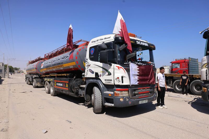 A tanker bearing Qatari flags and carrying fuel for Gaza's sole power plant arrives at the Rafah crossing in the southern Gaza Strip on June 28. AFP