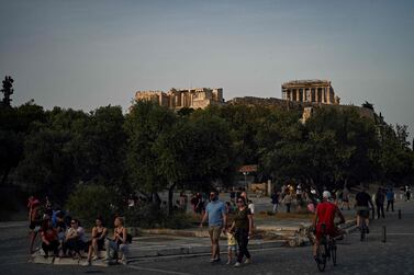 The towering Acropolis has survived through thousands of years of change in Greece. AFP