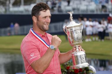 Jon Rahm of Spain celebrates with the trophy after winning the final round of the 2021 U.S. Open at Torrey Pines Golf Course (South Course) on June 20, 2021 in San Diego, California. AFP