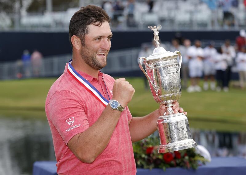 SAN DIEGO, CALIFORNIA - JUNE 20: Jon Rahm of Spain celebrates with the trophy after winning the final round of the 2021 U.S. Open at Torrey Pines Golf Course (South Course) on June 20, 2021 in San Diego, California.   Ezra Shaw/Getty Images/AFP
== FOR NEWSPAPERS, INTERNET, TELCOS & TELEVISION USE ONLY ==
