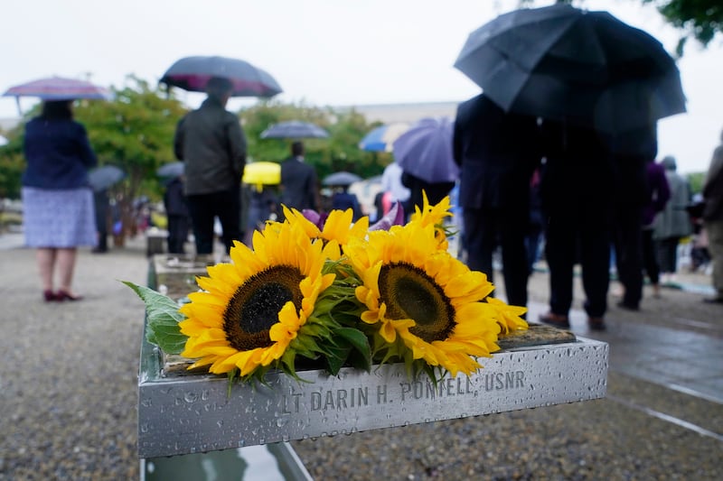 The National 9/11 Pentagon Memorial outside the Pentagon in Washington, during a ceremony to honour and remember the victims of the terror attack.  AP Photo 