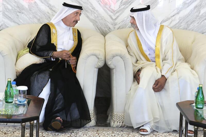 Sheikh Nahyan bin Mubarak, Minister for Culture, Youth and Community Development speaks to another Sheikh before the start of the graduation ceremony. Delores Johnson / The National