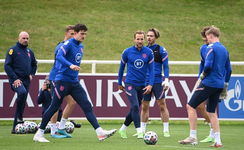 Harry Maguire, Harry Kane,  Jack Grealish, and Jordan Pickford attend an England training session at St George's Park ahead of the Euro 2020 semi-final against Denmark.