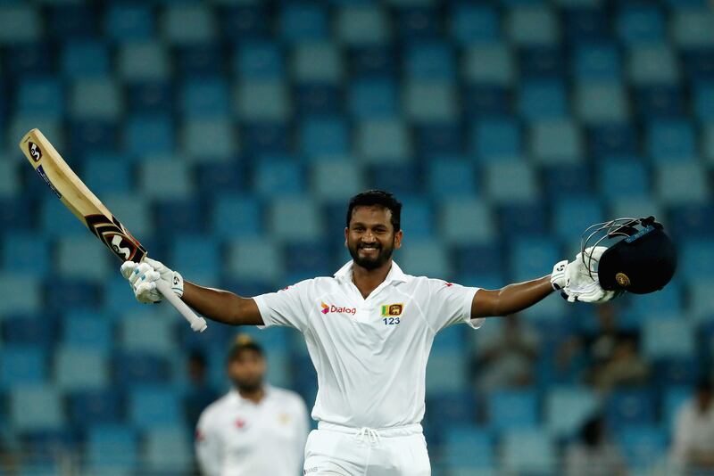 DUBAI, UNITED ARAB EMIRATES - OCTOBER 06:  Dimuth Karunaratne of Sri Lanka celebrate after reaching his century during Day One of the Second Test between Pakistan and Sri Lanka at Dubai International Cricket Ground on October 6, 2017 in Dubai, United Arab Emirates.  (Photo by Francois Nel/Getty Images)