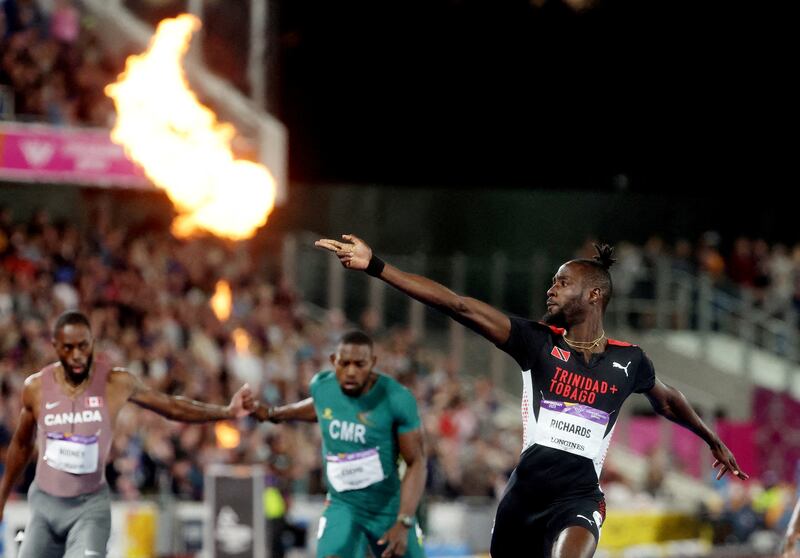 Trinidad And Tobago's Jereem Richards celebrates after winning gold in the Commonwealth Games men's 200m race at Alexander Stadium, England, on August 6, 2022. Reuters