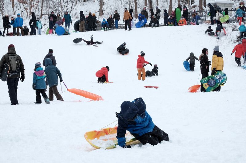 People go sledding in Prospect Park, in the Brooklyn borough of New York. AFP