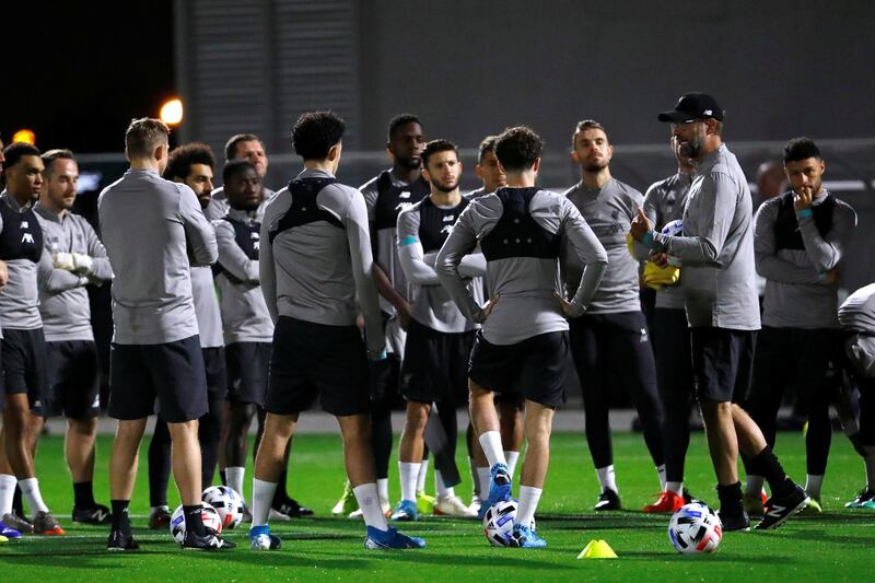 Juegen Klopp speaks with his players during training at Qatar University in Doha. Reuters