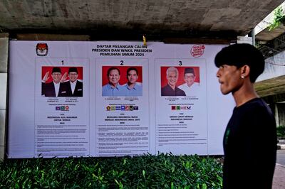 A banner in Jakarta shows the photos of Indonesia's presidential and vice presidential candidates. AP