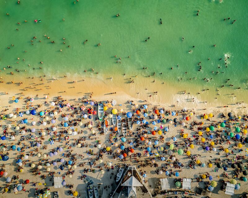 Honourable Mention, People and Nature, Marcelo Paulo Silva, Brazil. A Rio de Janeiro beach on the first day after lockdown was lifted.