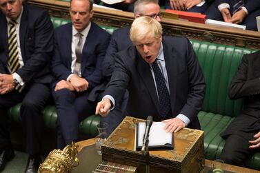 British Prime Minister Boris Johnson gestures during a session in the House of Commons in London. British MPs voted 328 to 321 to take control of the parliamentary agenda to prevent a no-deal Brexit. EPA