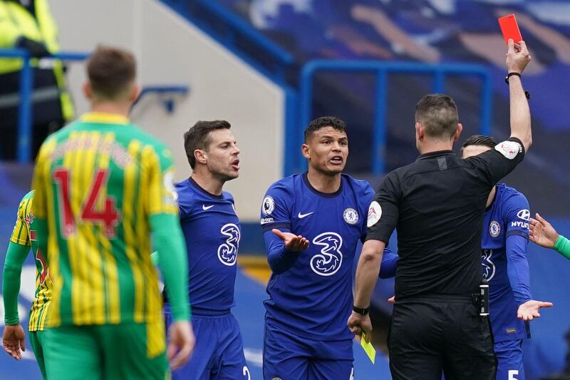 Referee David Coote shows Chelsea's defender Thiago Silva the red card. AFP