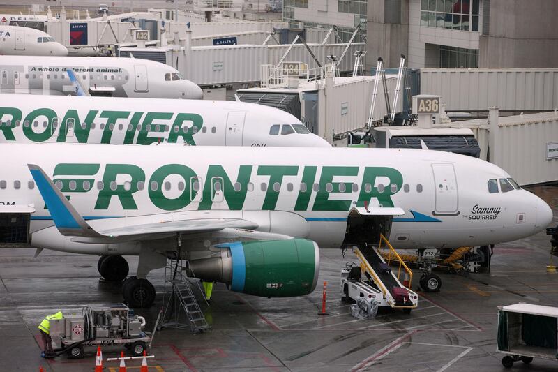 Frontier Airlines Inc. planes sit on the tarmac at Denver International Airport (DIA) in Denver, Colorado, U.S., on Tuesday, April 4, 2017. Frontier Airlines Inc., the no-frills U.S. carrier whose aircraft feature animals on the tails, is aiming to go public as soon as the second quarter, people with knowledge of the matter said. Photographer: Matt Staver/Bloomberg