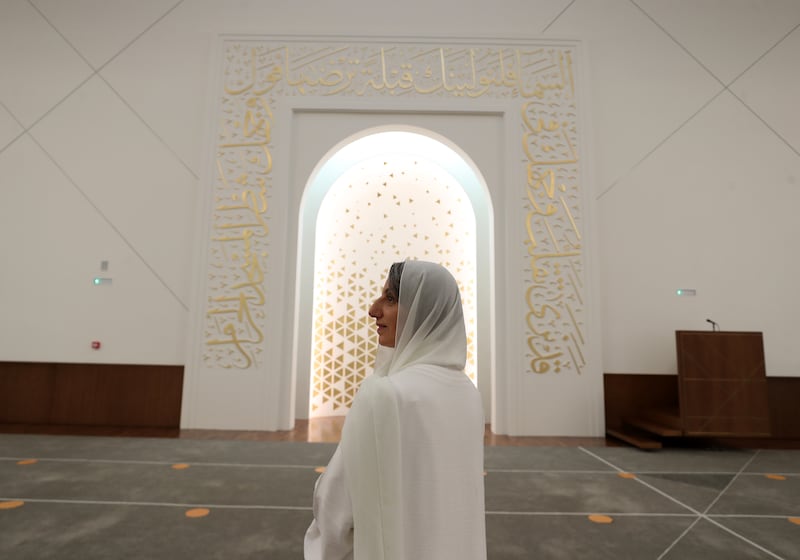 Carefully selected passages from the Quran are stencilled onto the walls around the mihrab.