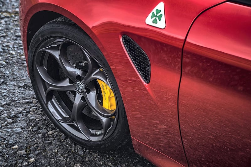 It comes standard with giant 361mm front and 351mm rear vented disc brakes.  Alfa Romeo