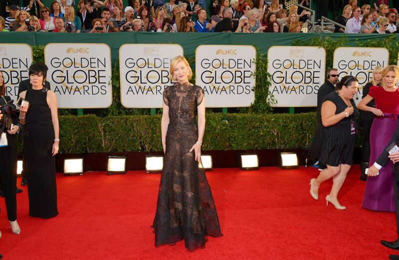 Cate Blanchett arrives at the 71st annual Golden Globe Awards at the Beverly Hilton Hotel in Beverly Hills. John Shearer/Invision/AP