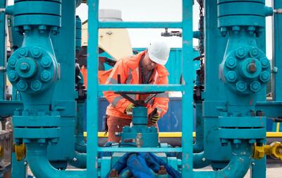 A worker at the Cuadrilla fracking site in Preston New Road, Little Plumpton, Lancashire where operations are expected to start next week. (Photo by Danny Lawson/PA Images via Getty Images)