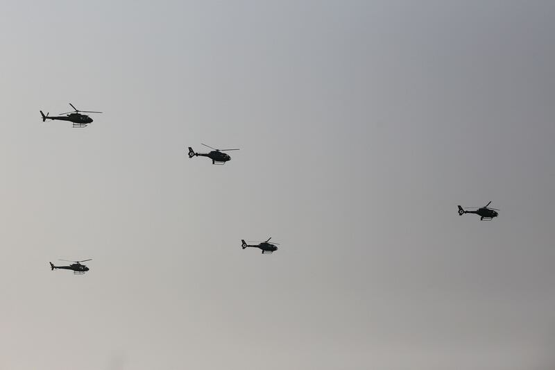 Myanmar Air Force helicopers take part in a display. AFP