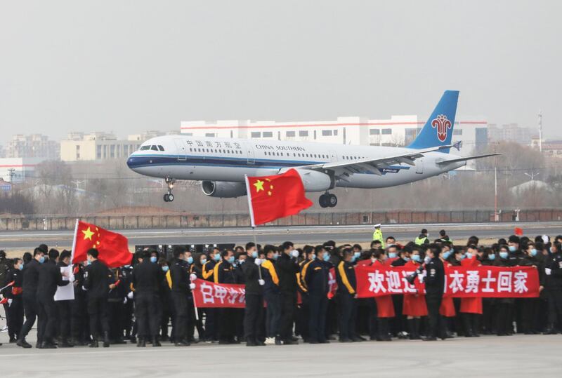 An airplane carrying 137 members of a medical assistance team from Shenyang returns home after helping with the COVID-19 coronavirus recovery effort in Wuhan, at Shenyang Taoxian Airport in Shenyang in China's northeastern Liaoning province. AFP