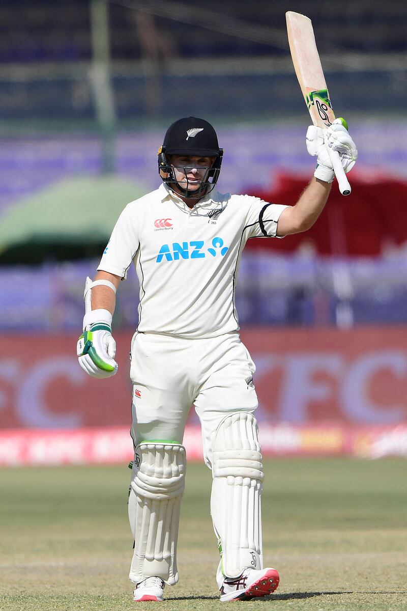 New Zealand's Tom Latham celebrates after scoring a half century. AFP