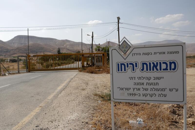 epa07839639 A sign at the entrance of the Israeli settlement of Mevo'ot Jericho in the Jordan valley reads in Hebrew 'A religious community settlement, build on 1999', West Bank, 13 September 2019. According to media reports, Israeli Prime Minister Benjamin Netanyahu said he intends in the 15 September cabinet meeting to take another step and bring the government decision to settle the settlement of Mevo'ot Jericho. Netanyahu has stated its intention to annex and contain Israeli sovereignty over the Jordan Valley in coordination with the US administration immediately after the elections. Israeli legislative election will be held on 17 September.  EPA/ATEF SAFADI