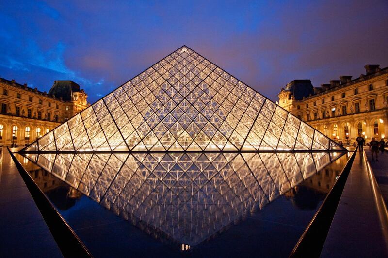 Louvre Pyramid By The Architect I.M. Pei At Night, Paris, France (Photo by: Insights/UIG via Getty Images)