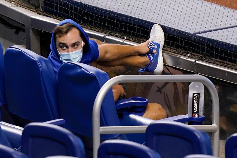 New York Mets right fielder Michael Conforto sits in the stands before a baseball game against the Miami Marlins in Miami, Florida, USA. AP Photo