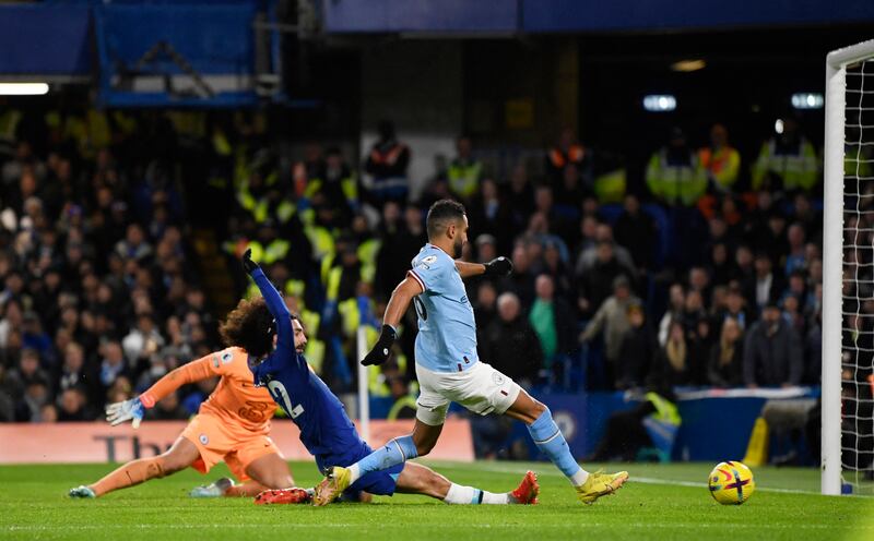 Manchester City's Riyad Mahrez scores their first goal. Reuters